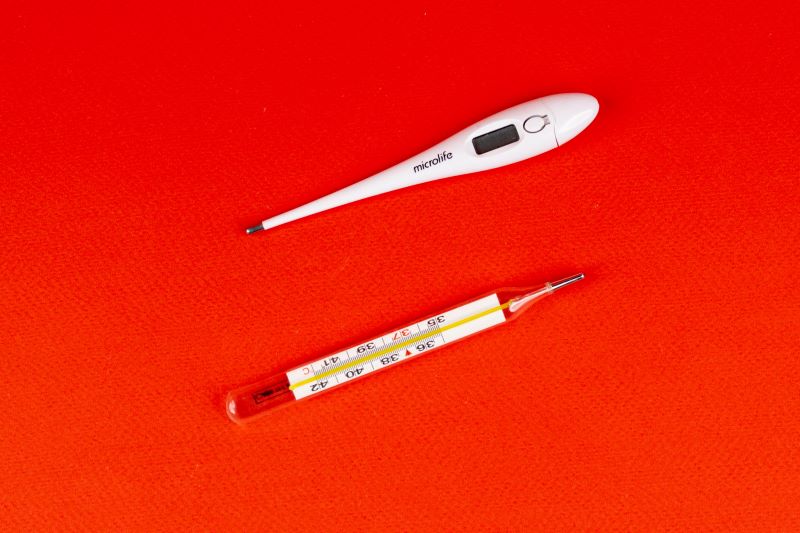 Thermometer and an Injection