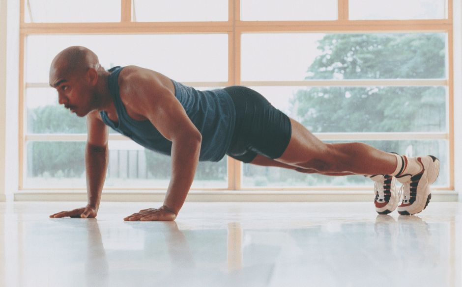  A man doing bodyweight workouts